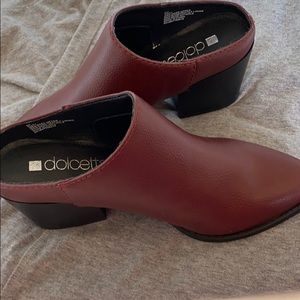 Burgundy open ankle booties with moderate heels.
